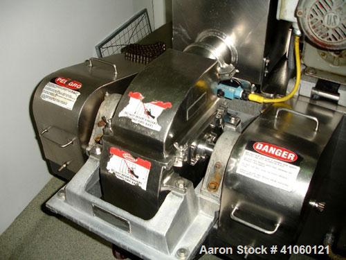 Used Fitzpatrick Fitzmill, Model DASO6, Stainless Steel. Fixed blades, reversible chamber, screw feed with motors, serial #5522.