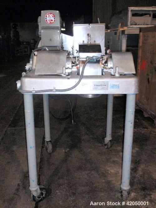 Used Fitzpatrick Fitzmill, Model DASO6, stainless steel. (16) Impact/knife fixed stainless steel blades, 11" x 13" cutting chamber. (1) Screw feed with hopper, driven by a 1/2 hp motor. Jacket feed t...