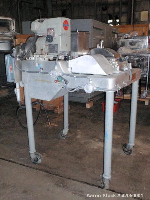 Used Fitzpatrick Fitzmill, Model DASO6, stainless steel. (16) Impact/knife fixed stainless steel blades, 11" x 13" cutting chamber. (1) Screw feed with hopper, driven by a 1/2 hp motor. Jacket feed t...