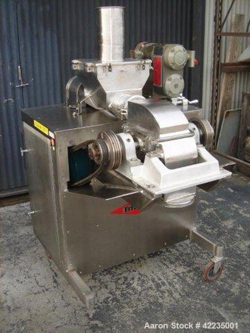 Used Fitzpatrick Fitzmill, Model U, Code DASO6, Stainless Steel. (16) Impact/knife fixed blades. 11" x 13" cutting chamber. Approximate 6" diameter screw feed with hopper, driven by a variable speed ...