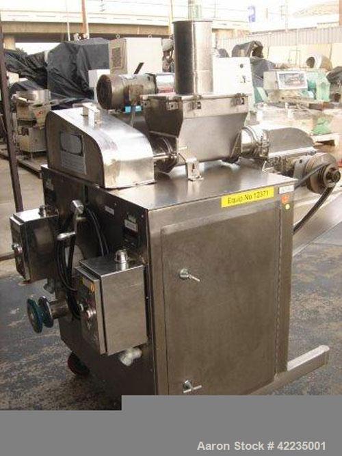 Used Fitzpatrick Fitzmill, Model U, Code DASO6, Stainless Steel. (16) Impact/knife fixed blades. 11" x 13" cutting chamber. Approximate 6" diameter screw feed with hopper, driven by a variable speed ...