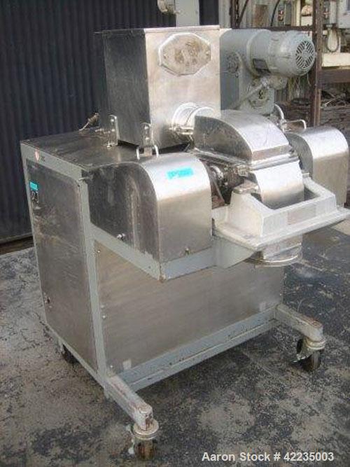 Used Fitzpatrick Fitzmill, Model U, Code DASO6, Stainless Steel. (16) Impact/knife fixed blades. 11" x 13" cutting chamber. Approximate 6" diameter screw feed with hopper, driven by a variable speed ...
