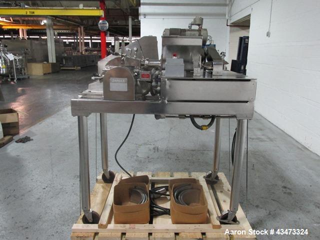 Used Fitzpatrick Fitzmill, Model DASO6. Stainless steel construction, fixed knives, jacketed cover and mill housing, screw feed driven by 0.25hp, 230/460 volt XP variable speed drive, on stainless st...