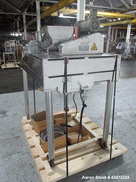 Used Fitzpatrick Fitzmill, Model DASO6. Stainless steel construction, fixed knives, jacketed cover and mill housing, screw feed driven by 0.25hp, 230/460 volt XP variable speed drive, on stainless st...