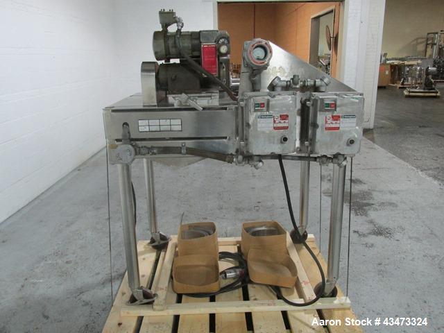 Used Fitzpatrick Fitzmill, Model DASO6. Stainless steel construction, fixed knives, jacketed cover and mill housing, screw feed driven by 0.25hp, 230/460 volt XP variable speed drive, on stainless st...