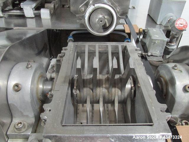 Used Fitzpatrick Fitzmill, Model DASO6. Stainless steel construction, fixed knives, jacketed cover and mill housing, screw feed driven by 0.25hp, 230/460 volt XP variable speed drive, on stainless st...