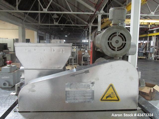 Used Fitzpatrick Fitzmill, Model DASO6. Stainless steel construction, fixed knives, jacketed cover and mill housing, screw feed driven by 0.25hp, 230/460 volt XP variable speed drive, on stainless st...