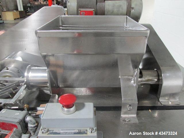 Used Fitzpatrick Fitzmill, Model DASO6. Stainless steel construction, fixed knives, jacketed cover and mill housing, screw feed driven by 0.25hp, 230/460 volt XP variable speed drive, on stainless st...