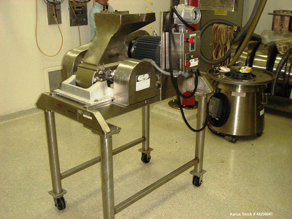 Used Fitzpatrick Fitzmill, Model DASO6. Stainless steel construction, pan feed, on base with motor, serial #8649.