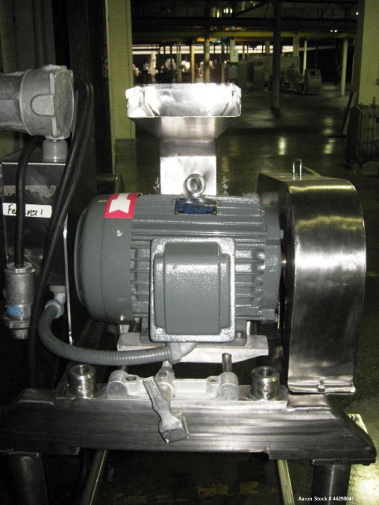 Used Fitzpatrick Fitzmill, Model DASO6. Stainless steel construction, pan feed, on base with motor, serial #8649.