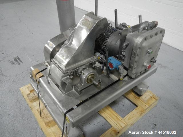 Used Fitzpatrick Fitzmill, Model DASO6, Stainless Steel. Knife/impact fixed blades. Mounted on a base and pedestal with a 7.5hp, 230/460 volt, 1750 rpm XP motor. Gravity feed throat, missing feed pan...