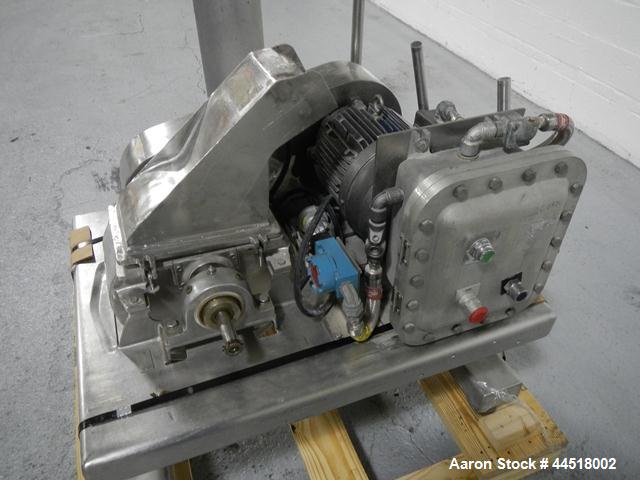 Used Fitzpatrick Fitzmill, Model DASO6, Stainless Steel. Knife/impact fixed blades. Mounted on a base and pedestal with a 7.5hp, 230/460 volt, 1750 rpm XP motor. Gravity feed throat, missing feed pan...