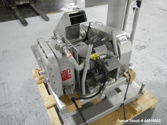 Used Fitzpatrick Fitzmill, Model DASO6, Stainless Steel. Knife/impact fixed blades. Mounted on a base and pedestal with a 7.5hp, 230/460 volt, 1750 rpm XP motor. Gravity feed throat, missing feed pan...