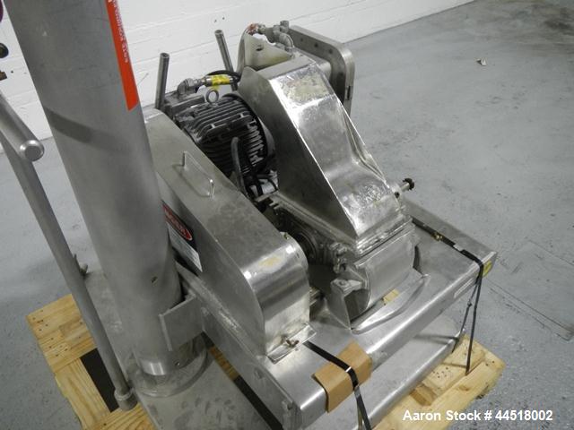 Used Fitzpatrick Fitzmill, Model DASO6, Stainless Steel. Knife/impact fixed blades. Mounted on a base and pedestal with a 7.5hp, 230/460 volt, 1750 rpm XP motor. Gravity feed throat, missing feed pan...