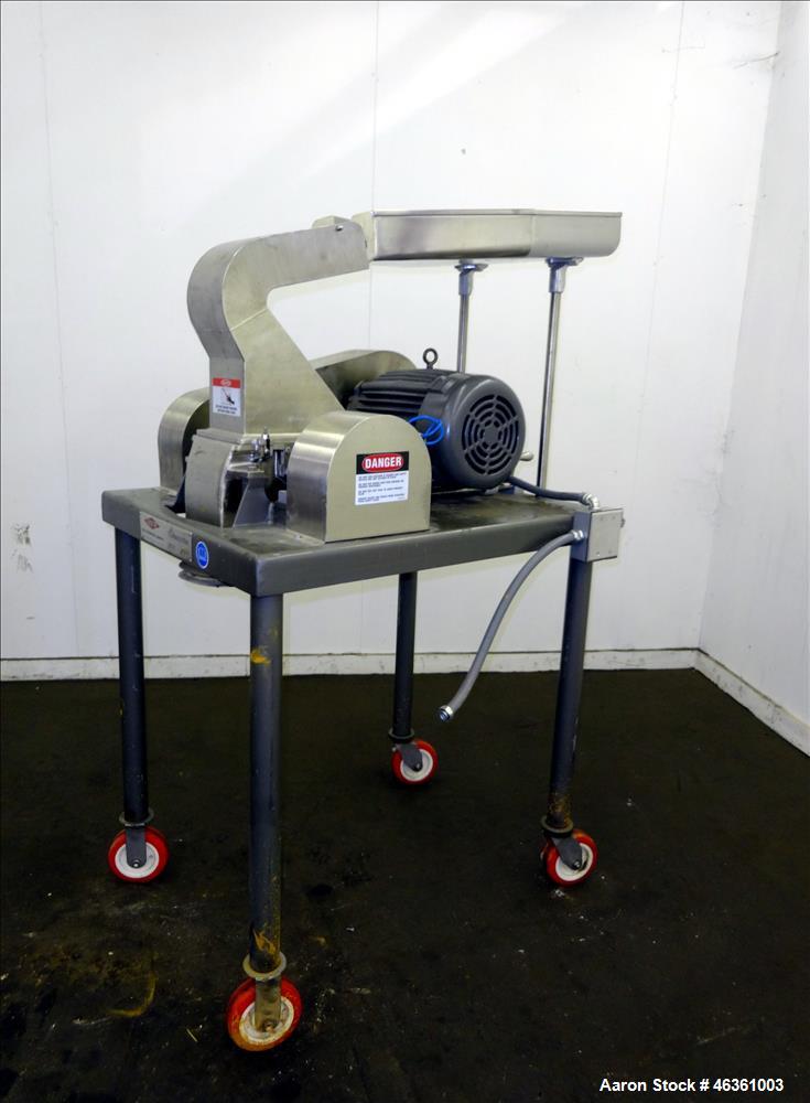 Used Fitzpatrick Fitzmill, Model DASO6, 316 Stainless Steel. (16) 10-1/2" diameter impact/knife fixed 410/16 stainless steel. Chamber approximate 11" long x 6" wide. Gravity pan feed. 1" Diameter bot...