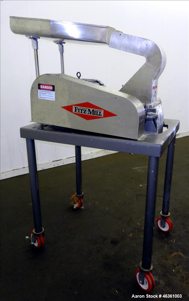 Used Fitzpatrick Fitzmill, Model DASO6, 316 Stainless Steel. (16) 10-1/2" diameter impact/knife fixed 410/16 stainless steel. Chamber approximate 11" long x 6" wide. Gravity pan feed. 1" Diameter bot...