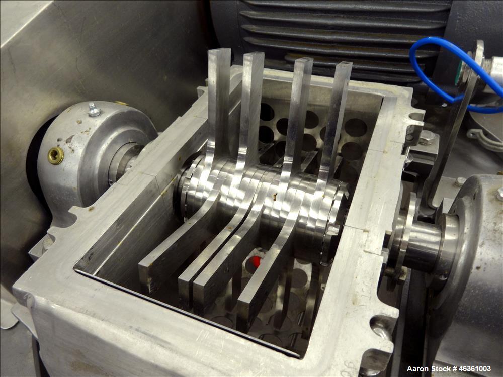 Used Fitzpatrick Fitzmill, Model DASO6, 316 Stainless Steel. (16) 10-1/2" diameter impact/knife fixed 410/16 stainless steel. Chamber approximate 11" long x 6" wide. Gravity pan feed. 1" Diameter bot...