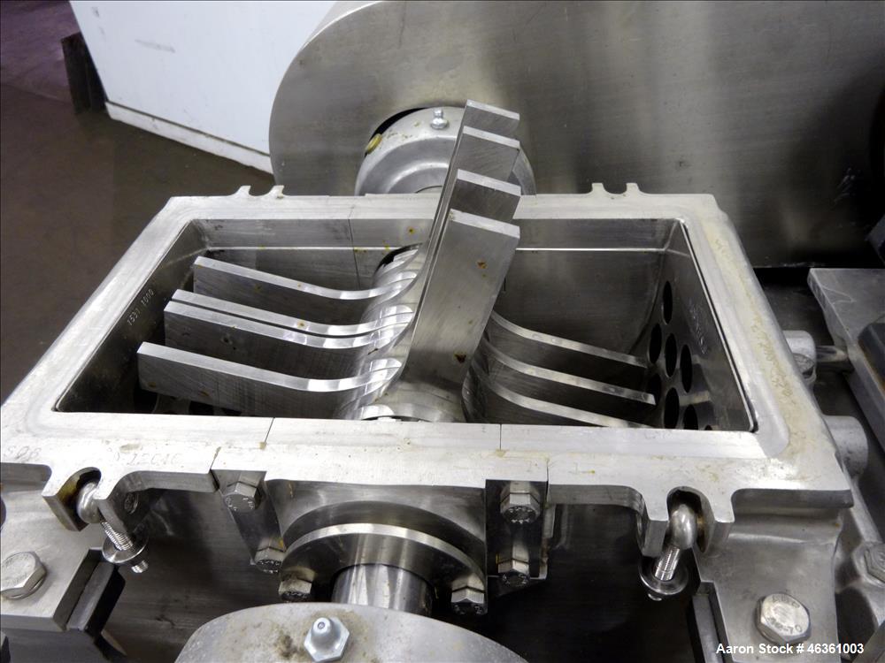 Used Fitzpatrick Fitzmill, Model DASO6, 316 Stainless Steel. (16) 10-1/2" diameter impact/knife fixed 410/16 stainless steel. Chamber approximate 11" long x 6" wide. Gravity pan feed. 1" Diameter bot...