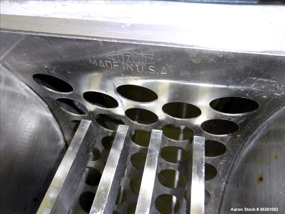 Used Fitzpatrick Fitzmill, Model DASO6, 316 Stainless Steel. (16) 10-1/2" diameter impact/knife fixed 410/16 stainless steel. Chamber approximate 11" long x 6" wide. Gravity pan feed. 1" Diameter bot...