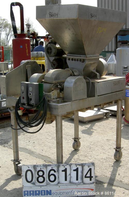 USED: Fitzpatrick Fitzmill, model DASO-6, 304 stainless steel. 16 fixed impact/knife blades, 6" x 11" cutting chamber, 4" diameter feed screw with hopper, driven by an approx 1/4 hp varispeed motor. ...