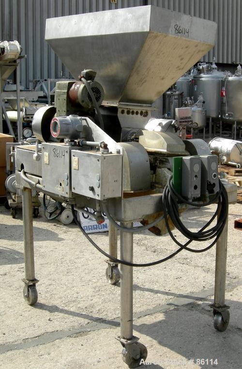 USED: Fitzpatrick Fitzmill, model DASO-6, 304 stainless steel. 16 fixed impact/knife blades, 6" x 11" cutting chamber, 4" diameter feed screw with hopper, driven by an approx 1/4 hp varispeed motor. ...