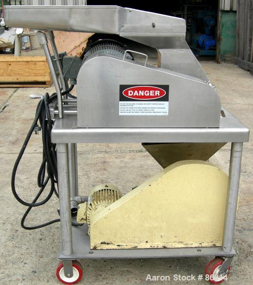 USED: Fitzpatrick Fitzmill, model DASO6, stainless steel. (16) 410 stainless steel fixed hook knife/impact blades. 6" x 11" cutting chamber with bottom screen. Gravity feed feed throat with pan. Driv...