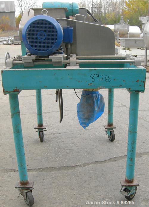 USED: Fitzpatrick Fitzmill, model DASO6, 316 stainless steel. (16) double sided fixed 410 stainless steel impact blades, 6" x 11" cutting chamber, 4" diameter x 16" long screw feed with hopper. Drive...