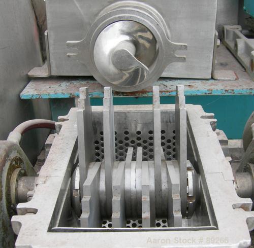 USED: Fitzpatrick Fitzmill, model DASO6, 316 stainless steel. (16) double sided fixed 410 stainless steel impact blades, 6" x 11" cutting chamber, 4" diameter x 16" long screw feed with hopper. Drive...