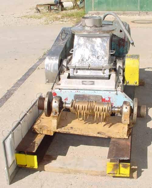 Used Fitzpatrick Fitzmill, Model DKAO12, Stainless Steel. (32) Impact/knife swinging blades, 13" x 11" cutting chamber, gravity feed throat, water cooled bearings, bottom. screen. Driven by a 30 hp, ...