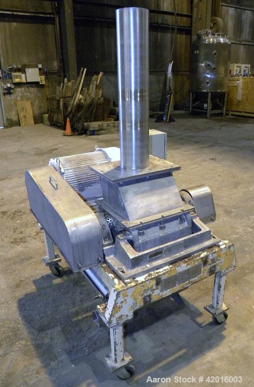 Used Fitzpatrick Fitzmill, model DKAO12, 316 stainless steel. (32) Double knife fixed 410 stainless steel blades, 11" x 13" cutting chamber, 304 stainless steel gravity feed, bottom screen with a 304...