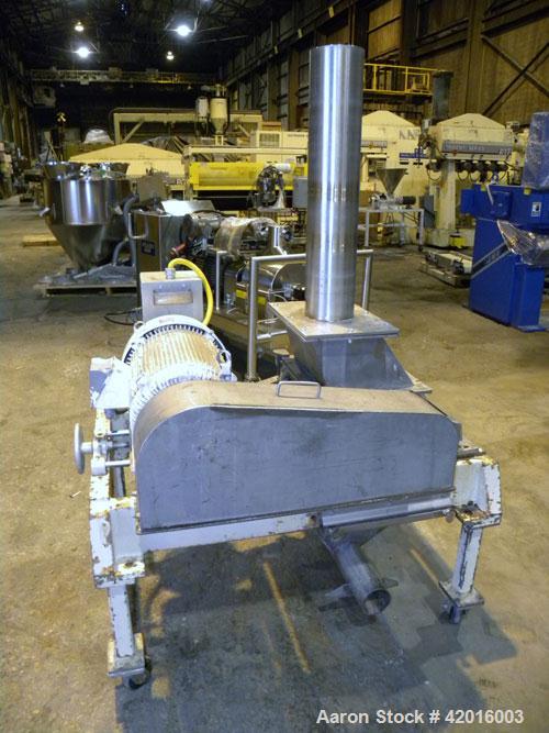 Used Fitzpatrick Fitzmill, model DKAO12, 316 stainless steel. (32) Double knife fixed 410 stainless steel blades, 11" x 13" cutting chamber, 304 stainless steel gravity feed, bottom screen with a 304...