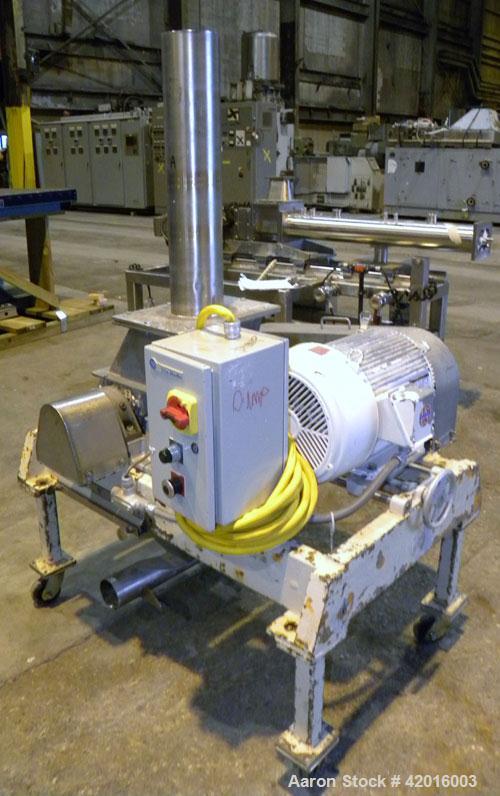 Used Fitzpatrick Fitzmill, model DKAO12, 316 stainless steel. (32) Double knife fixed 410 stainless steel blades, 11" x 13" cutting chamber, 304 stainless steel gravity feed, bottom screen with a 304...