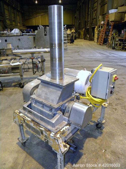 Used Fitzpatrick Fitzmill, model DKAO12, 316 stainless steel. (32) Double knife fixed 410 stainless steel blades, 11" x 13" cutting chamber, 304 stainless steel gravity feed, bottom screen with a 304...