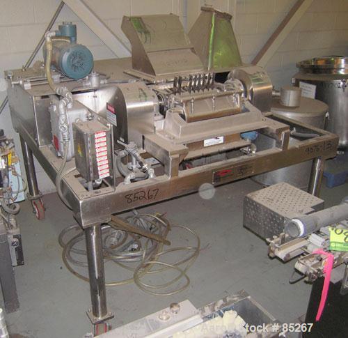 Used Fitzpatrick Fitzmill, Model DKA012, stainless steel. (32) Fixed impact/knife blades. 13" x 11" cutting chamber, gravity feed throat, no bottom screen. Includes a 3/4 hp feed motor, no feed syste...