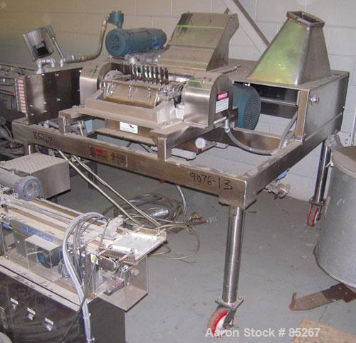 Used Fitzpatrick Fitzmill, Model DKA012, stainless steel. (32) Fixed impact/knife blades. 13" x 11" cutting chamber, gravity feed throat, no bottom screen. Includes a 3/4 hp feed motor, no feed syste...