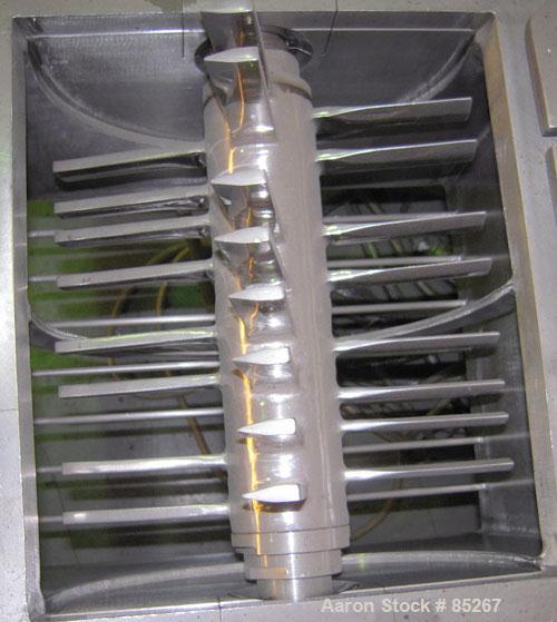 Used Fitzpatrick Fitzmill, Model DKA012, stainless steel. (32) Fixed impact/knife blades. 13" x 11" cutting chamber, gravity feed throat, no bottom screen. Includes a 3/4 hp feed motor, no feed syste...