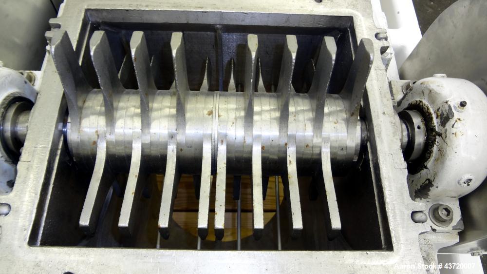 Used Fitzpatrick Fitzmill, Model DKASO12, Stainless Steel. (32) Impact/knife fixed 410/16/20 stainless steel blades, 11" x 13" 316 stainless steel cutting chamber. Missing feed throat and bottom scre...