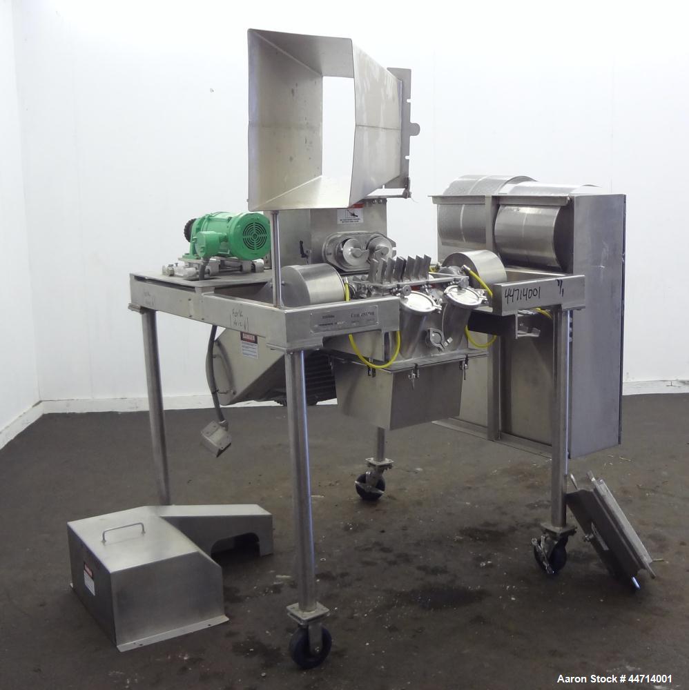 Used Fitzpatrick Fitzmill, Model DKASO12, 316 Stainless Steel. (32) Impact/knife fixed 410 stainless steel blades, 11" x 13" cutting chamber. (2) 4" Diameter x 20" long screw feed with hopper, driven...