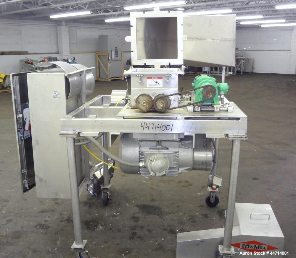 Used Fitzpatrick Fitzmill, Model DKASO12, 316 Stainless Steel. (32) Impact/knife fixed 410 stainless steel blades, 11" x 13" cutting chamber. (2) 4" Diameter x 20" long screw feed with hopper, driven...