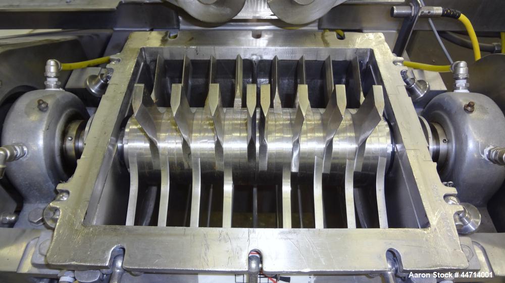Used Fitzpatrick Fitzmill, Model DKASO12, 316 Stainless Steel. (32) Impact/knife fixed 410 stainless steel blades, 11" x 13" cutting chamber. (2) 4" Diameter x 20" long screw feed with hopper, driven...