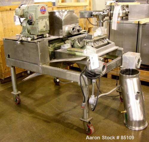 Used Fitzpatrick Fitzmill, Model DKASO-12, Stainless Steel. Twin screw feed wtih 1 hp, 230/460 volt XP drive, less rotor, cover, bearings, guard, ends and seals. Approximately 20 hp main drive.