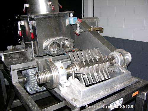 USED: Fitzmill model DKASO-12, stainless steel construction. Fixed knives, twin screw feed with 1 hp, 230/460 volt XP drive, 10/15 hp, 190/380/230/460 XP main drive. Missing feed throat. Mounted on l...