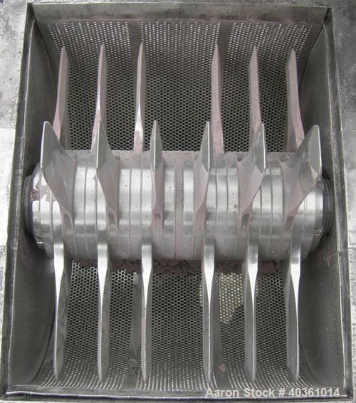 Used Fitzpatrick Fitzmill, Model DKASO12, 316 Stainless Steel. (24) 410 Stainless steel fixed double knife blades. 11" x 13" cutting chamber, bottom screen. Gravity fed feed throat, water cooled bear...