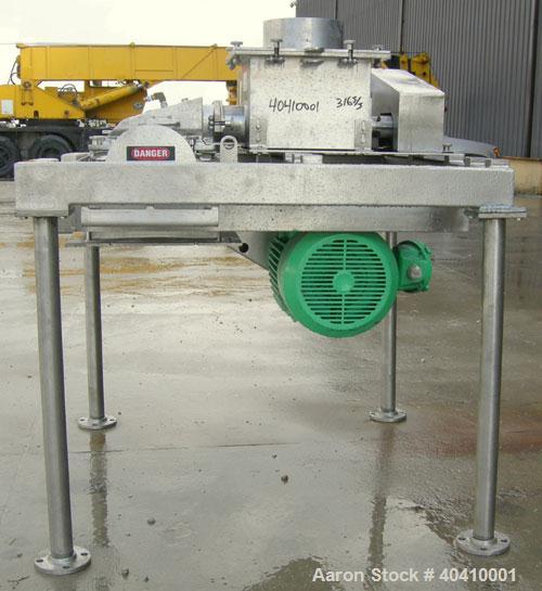 Used Fitzpatrick Fitzmill, Model DKASO12, 316 stainless steel. (32) impact/knife fixed 410 stainless steel blades, 11" x 13" cutting chamber. (2) 4" diameter x 20" long screw feed with hopper, driven...
