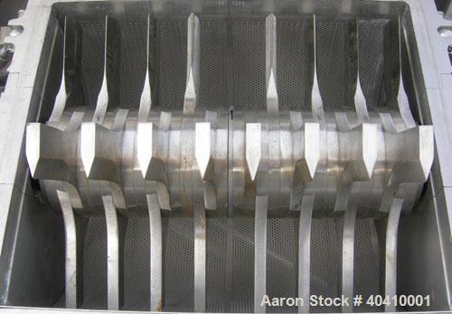 Used Fitzpatrick Fitzmill, Model DKASO12, 316 stainless steel. (32) impact/knife fixed 410 stainless steel blades, 11" x 13" cutting chamber. (2) 4" diameter x 20" long screw feed with hopper, driven...