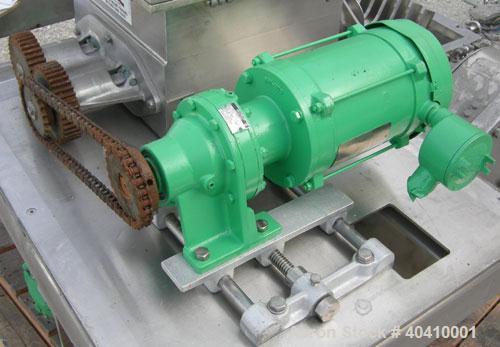 Used Fitzpatrick Fitzmill, Model DKASO12, 316 stainless steel. (32) impact/knife fixed 410 stainless steel blades, 11" x 13" cutting chamber. (2) 4" diameter x 20" long screw feed with hopper, driven...