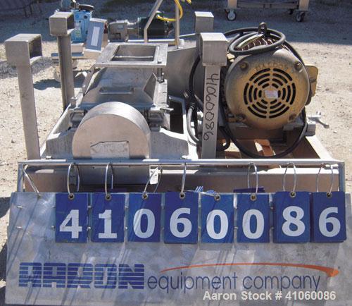 Used Fitzpatrick Fitzmill, Model DKASO12, 304 stainless steel. (32) impact/knife fixed 410 stainless steel blades, 11" x 13" cutting chamber, gravity feed hopper, no bottom screen. Driven by an appro...