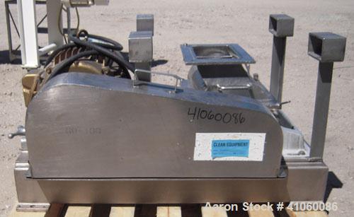 Used Fitzpatrick Fitzmill, Model DKASO12, 304 stainless steel. (32) impact/knife fixed 410 stainless steel blades, 11" x 13" cutting chamber, gravity feed hopper, no bottom screen. Driven by an appro...