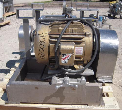Used Fitzpatrick Fitzmill, Model DKASO12, 304 stainless steel. (32) impact/knife fixed 410 stainless steel blades, 11" x 13" cutting chamber, gravity feed hopper, no bottom screen. Driven by an appro...