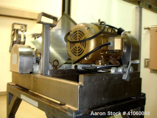 Used Fitzpatrick Fitzmill, Model DKASO 12, stainless steel construction, fixed knives, reversible chamber, gravity feed, 15 hp motor, belt driven, serial #8711.